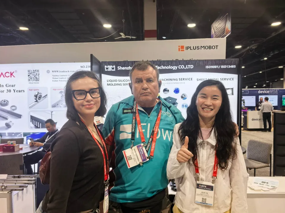 MIM Machining team networking with manufacturing professionals at IMTS Chicago