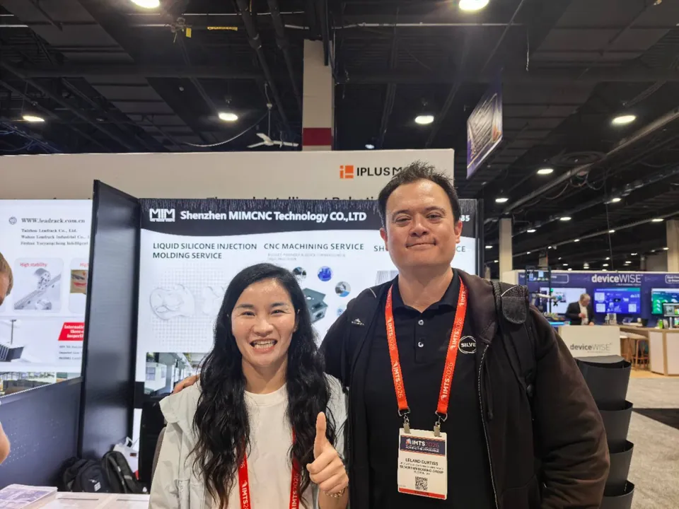 Custom machined parts project review with an attendee at IMTS Chicago