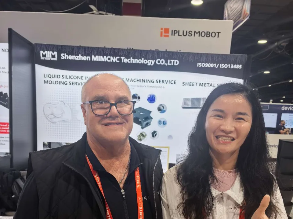 Precision parts customer partnership meeting at the MIM Machining IMTS booth