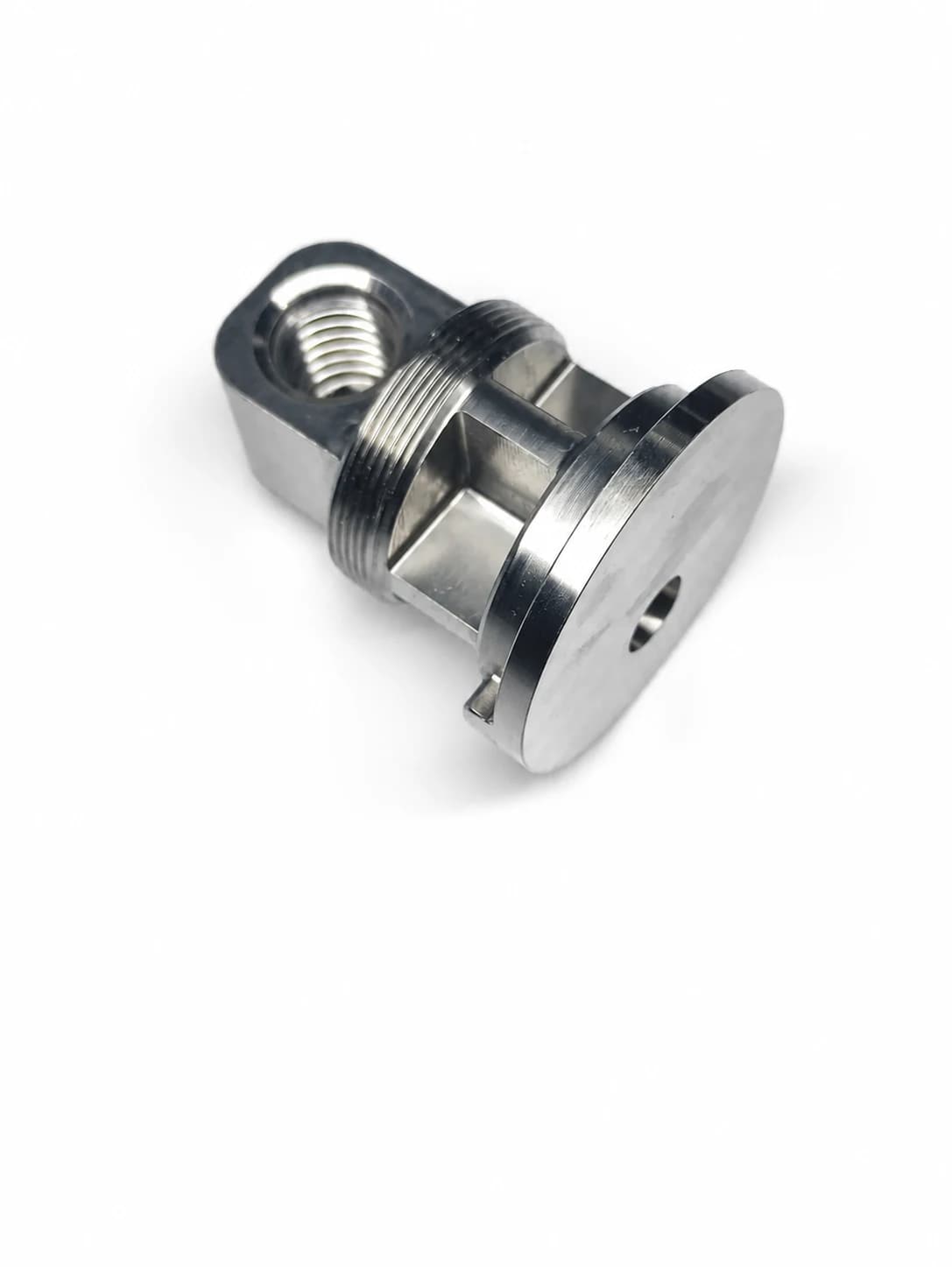 Machined angular fitting with internal and external threads