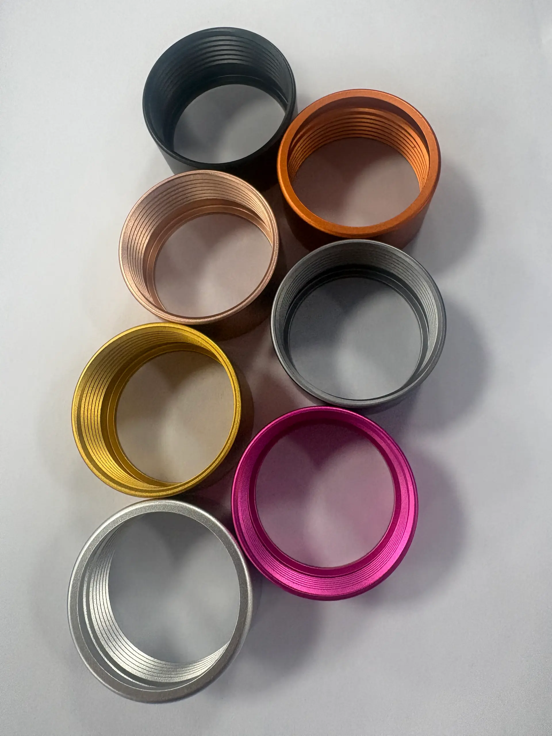 Anodized aluminum threaded rings in black, orange, bronze, gray, gold, pink and clear silver colors