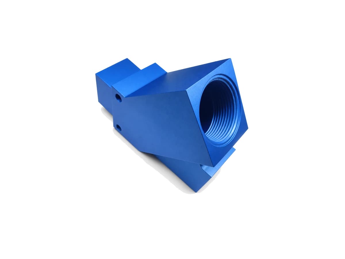 Blue anodized CNC machined aluminum component with internal thread on a pure white background
