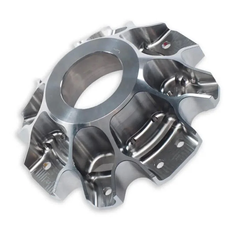 Complex silver 5-axis machined large component with a central bore pockets and multi-face features on a white background