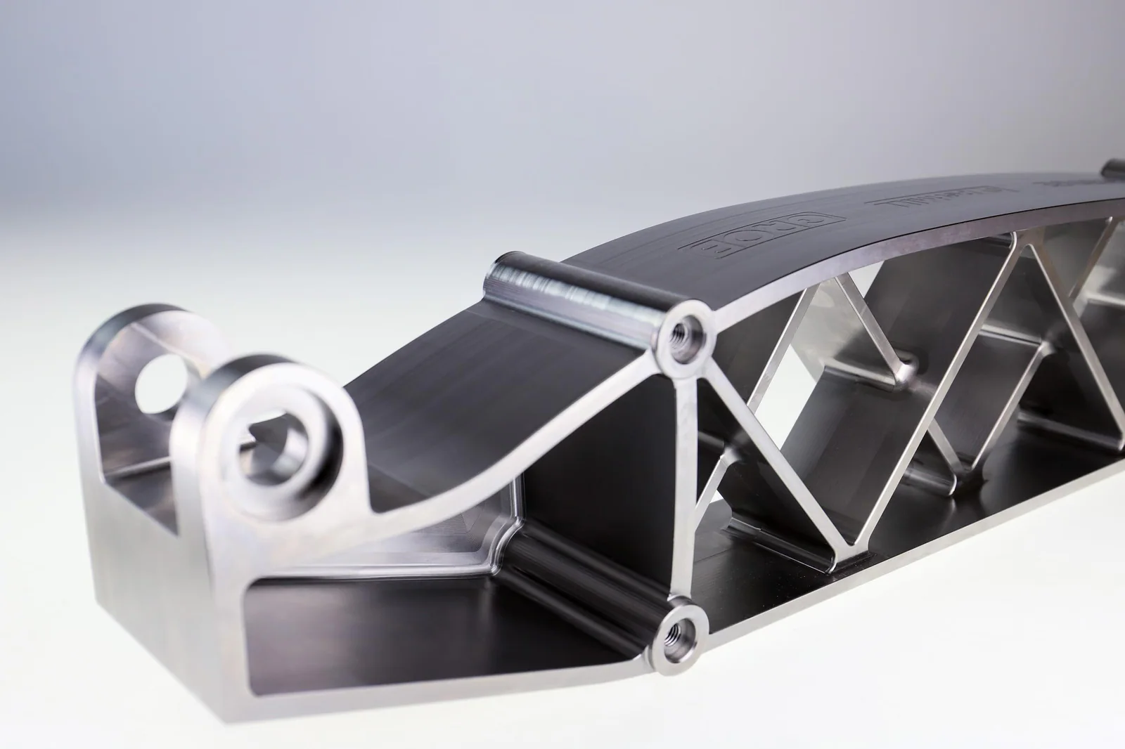 Large part CNC machined structural component with deep pockets ribs bores and extended machined surfaces