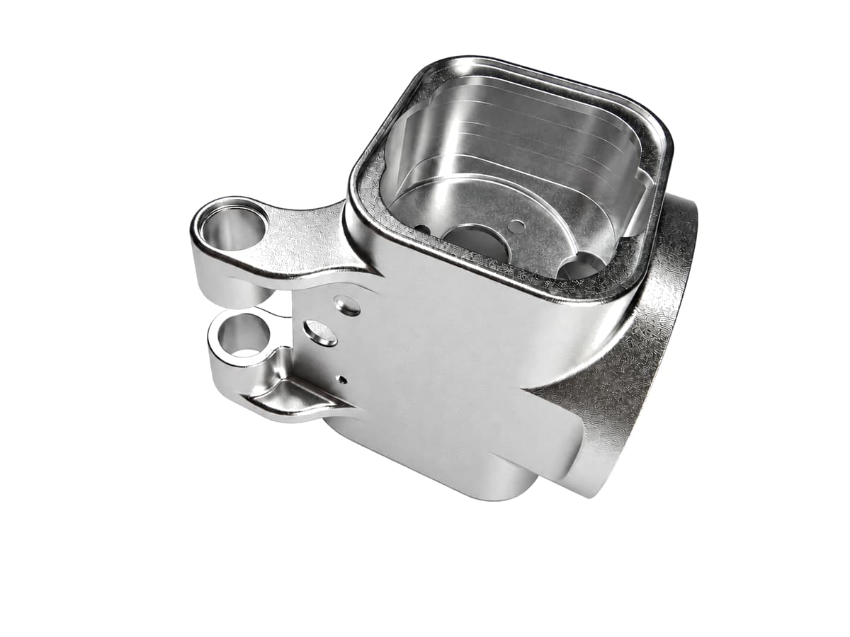 Precision CNC machining complex housing with cavities and mounting features on a pure white background